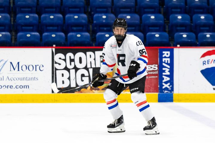 Image of Kaius Millan playing hockey